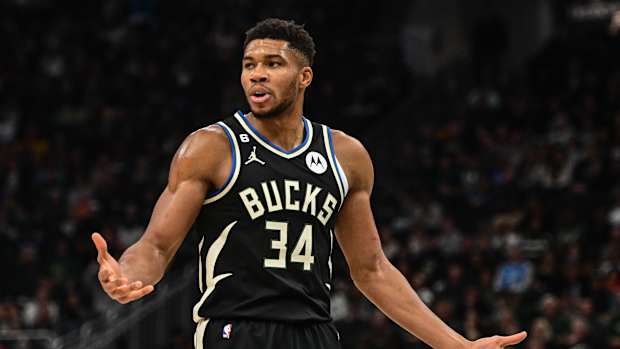 Giannis Antetokounmpo reacts after a foul call.